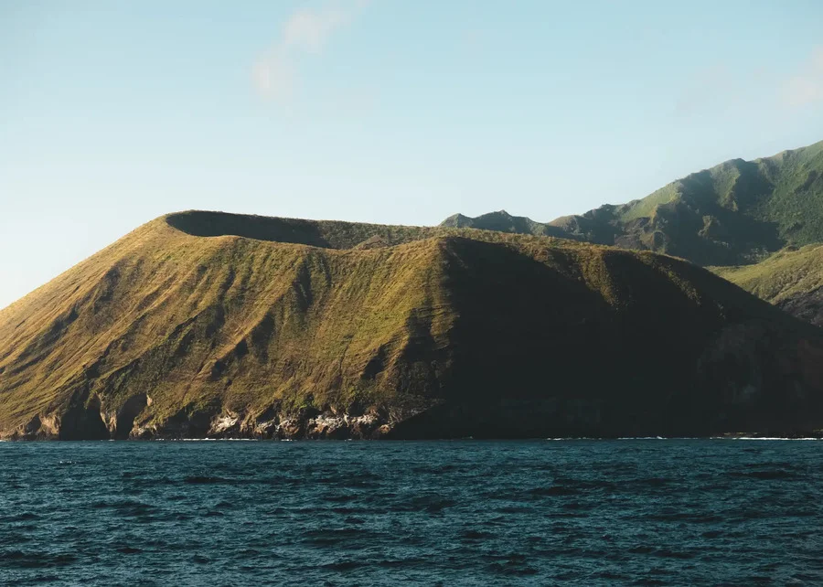 Aerial view of volcanic crater coastline in Galapagos